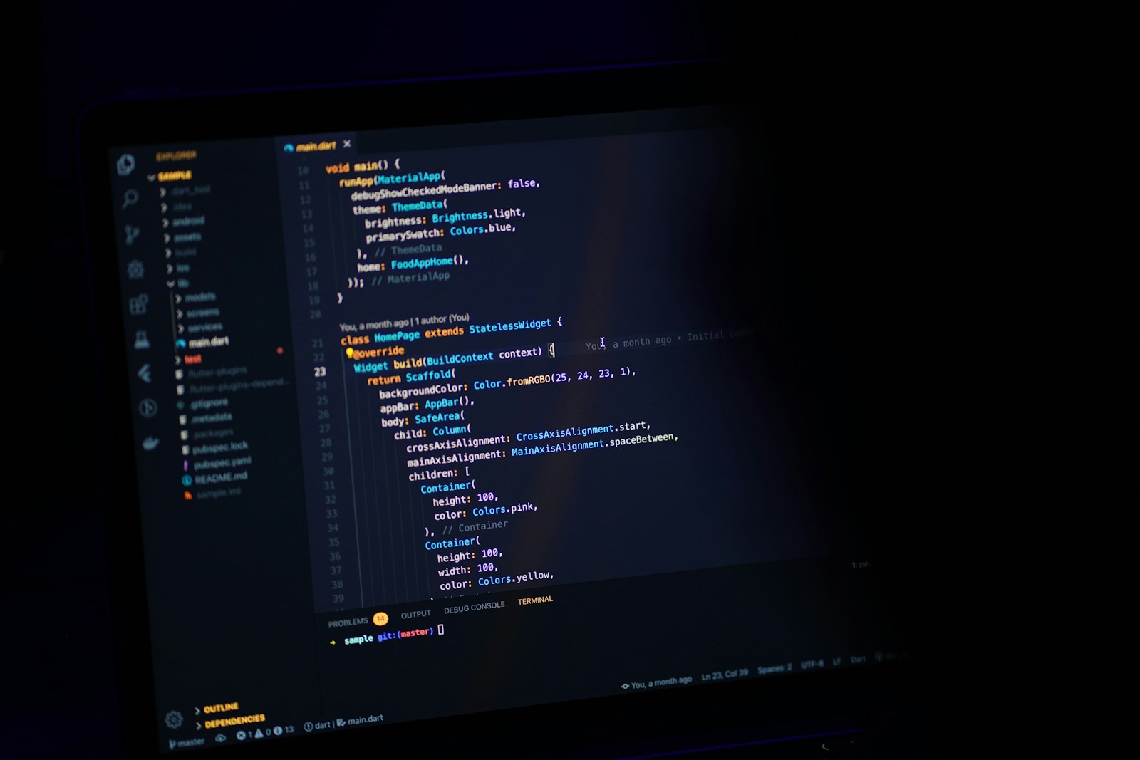 Code on a monitor in a dark room