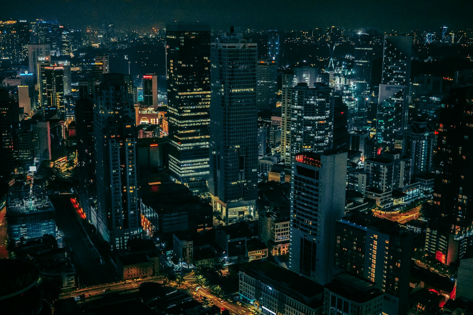 A city lit up at night, seen from above